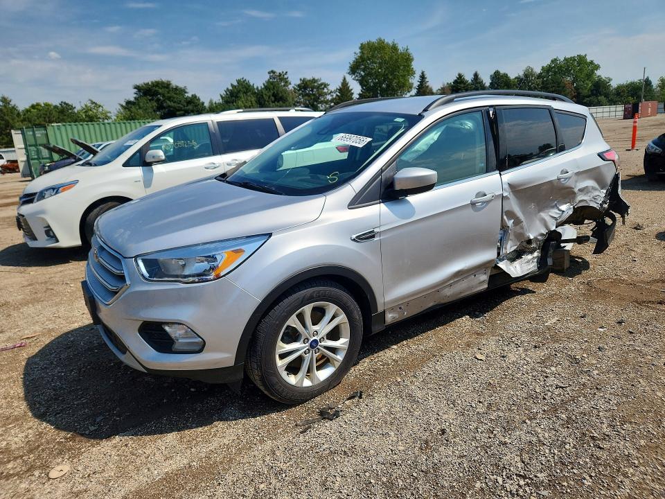 FORD ESCAPE 2018 with VIN 1FMCU9GD9JUA02480 - Photo from auction