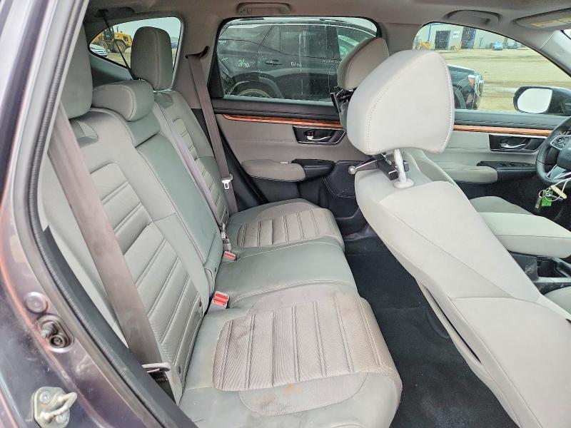 Photo 11 from auction – 2019 HONDA CR-V with VIN 5J6RW2H50KA020564