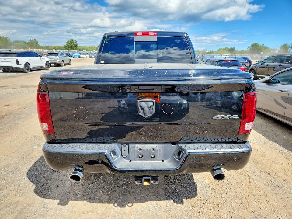 Photo 6 from auction – 2014 RAM 1500 with VIN 1C6RR7MT9ES201831
