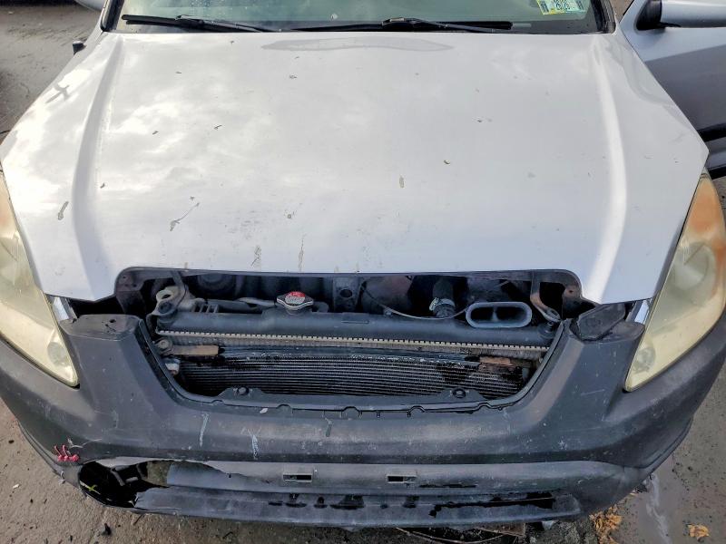 Photo 12 from auction – 2004 HONDA CR-V with VIN JHLRD78804C029617