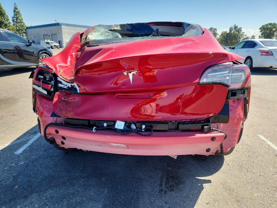 Photo 6 from auction – 2022 TESLA MODEL 3 with VIN 5YJ3E1EAXNF361010