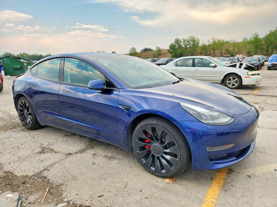 Photo 4 from auction – 2022 TESLA MODEL 3 with VIN 5YJ3E1EC6NF274402