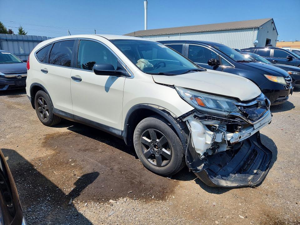 Photo 4 from auction – 2015 HONDA CR-V with VIN 2HKRM4H37FH130287