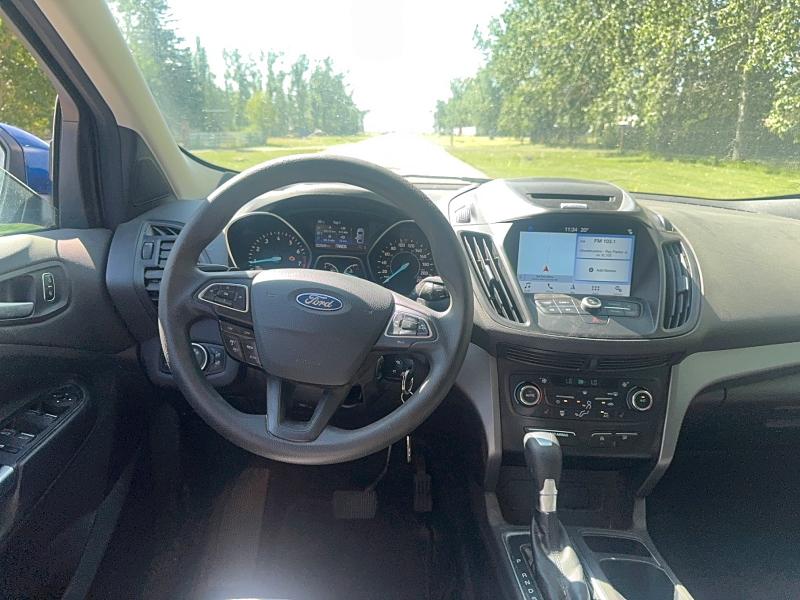 Photo 9 from auction – 2017 FORD ESCAPE with VIN 1FMCU9G95HUA55909
