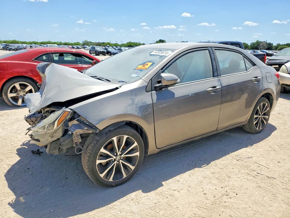 TOYOTA COROLLA 2017 with VIN 5YFBURHE0HP671199 - Photo from auction