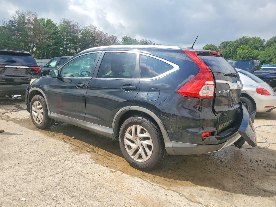 Photo 2 from auction – 2015 HONDA CR-V with VIN 2HKRM4H73FH698135