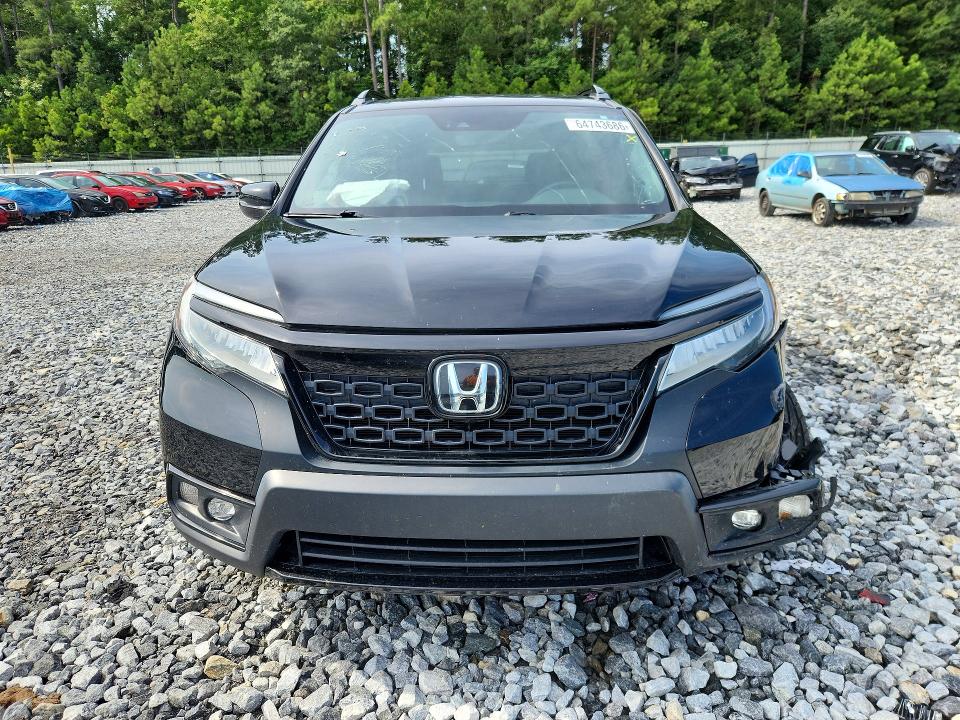 Photo 5 from auction – 2021 HONDA PASSPORT with VIN 5FNYF8H03MB035417