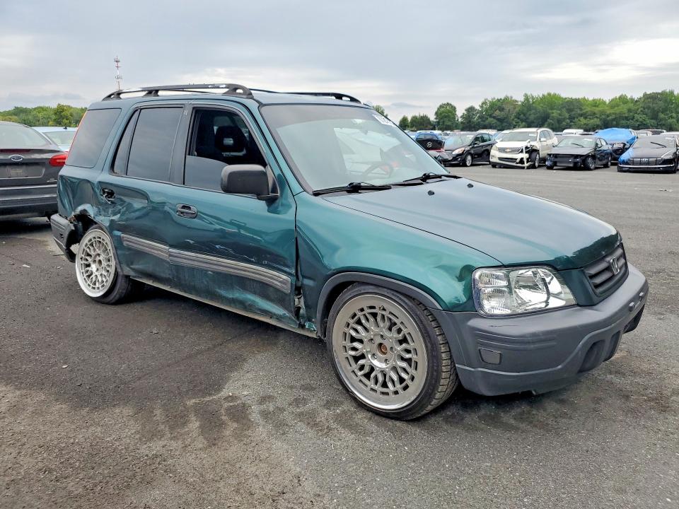 Photo 4 from auction – 1999 HONDA CR-V with VIN JHLRD1844XC002757
