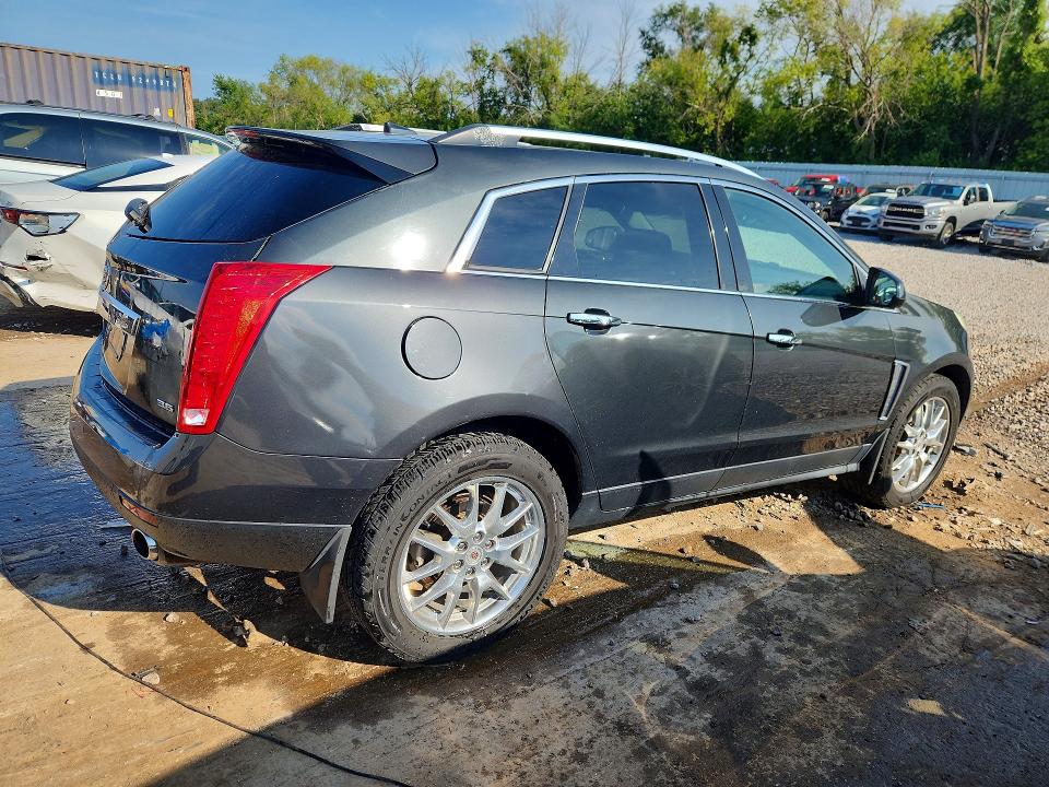 Photo 3 from auction – 2014 CADILLAC SRX with VIN 3GYFNDE31ES685173
