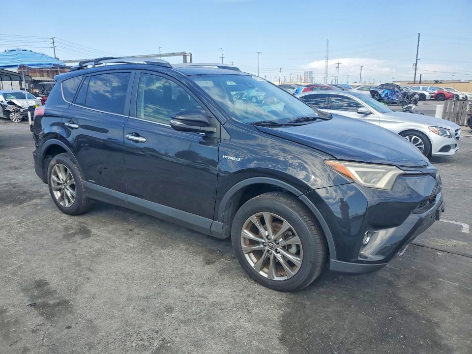 Photo 4 from auction – 2017 TOYOTA RAV4 HV with VIN JTMDJREV5HD152755