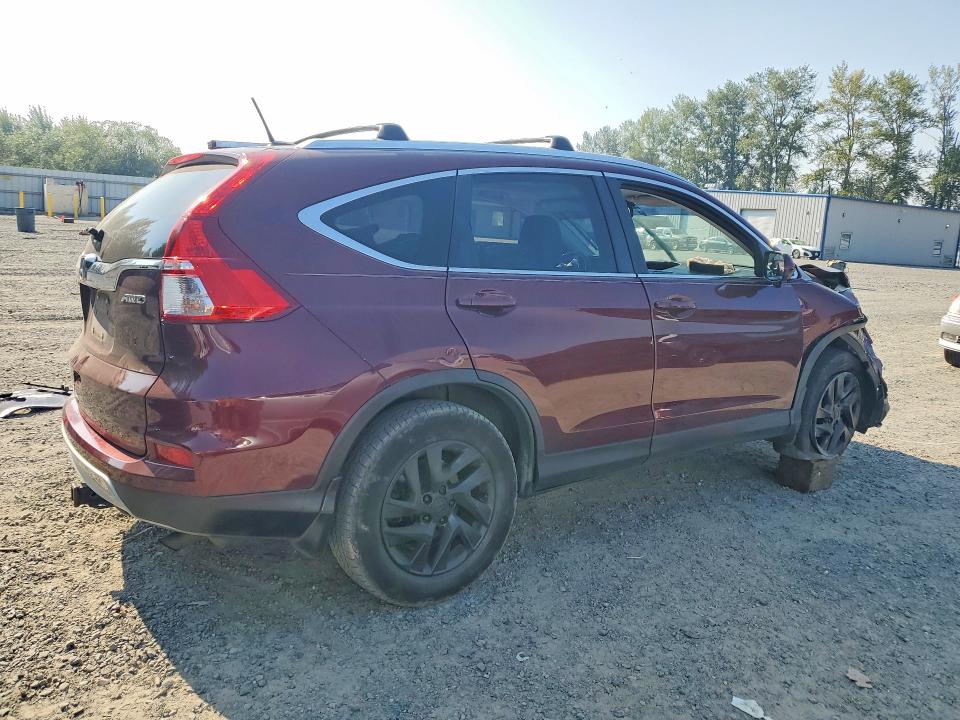 Photo 3 from auction – 2015 HONDA CR-V with VIN 2HKRM4H73FH640204