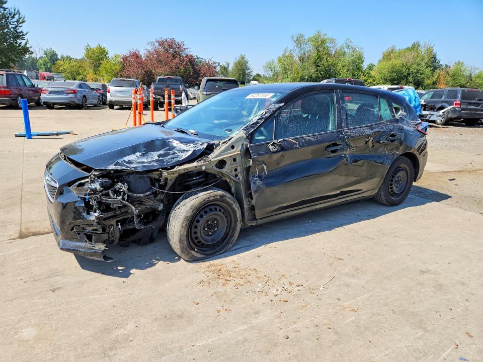 SUBARU IMPREZA 2019 with VIN 4S3GTAA62K3747261 - Photo from auction