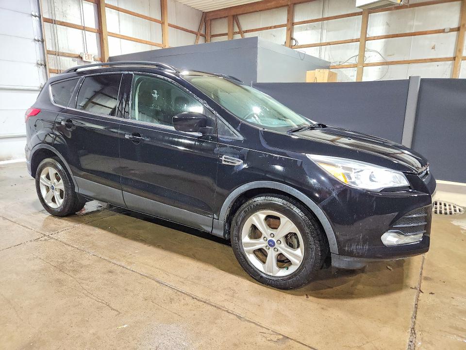 Снимка 4 от търг – 2016 FORD ESCAPE с VIN 1FMCU0GX2GUC77414