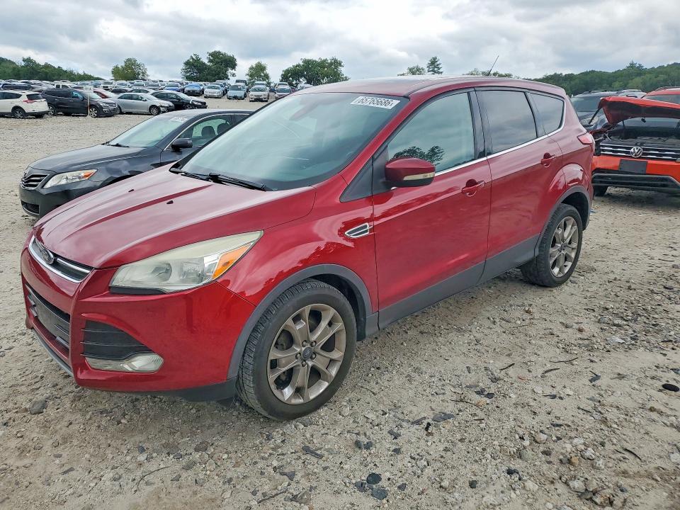 FORD ESCAPE 2013 with VIN 1FMCU0HX4DUB48925 - Photo from auction