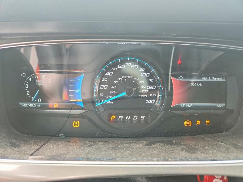 Photo 9 from auction – 2015 FORD TAURUS with VIN 1FAHP2H85FG179274