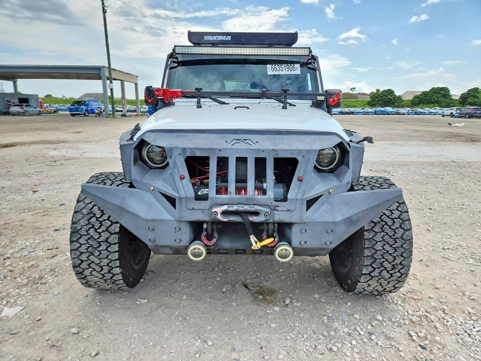 Снимка 5 от търг – 2015 JEEP WRANGLER UNLIMITED с VIN 1C4BJWDG8FL549291