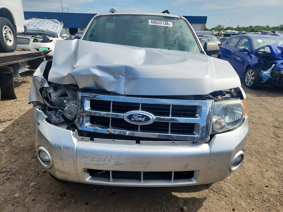 Photo 5 from auction – 2011 FORD ESCAPE with VIN 1FMCU0DGXBKB02546