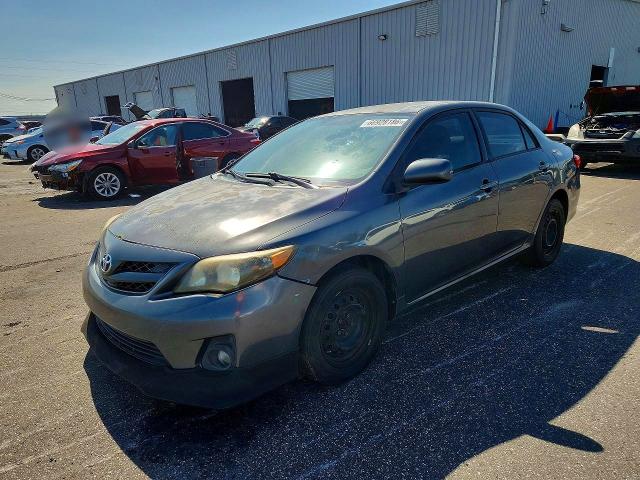 TOYOTA COROLLA 2011 with VIN 2T1BU4EE4BC577342 - Photo from auction
