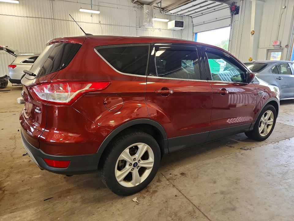 Photo 3 from auction – 2015 FORD ESCAPE with VIN 1FMCU9GX6FUB30757