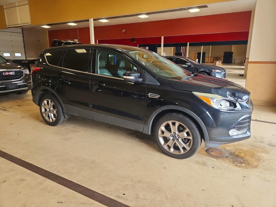 Photo 4 from auction – 2013 FORD ESCAPE with VIN 1FMCU9HX0DUD30268
