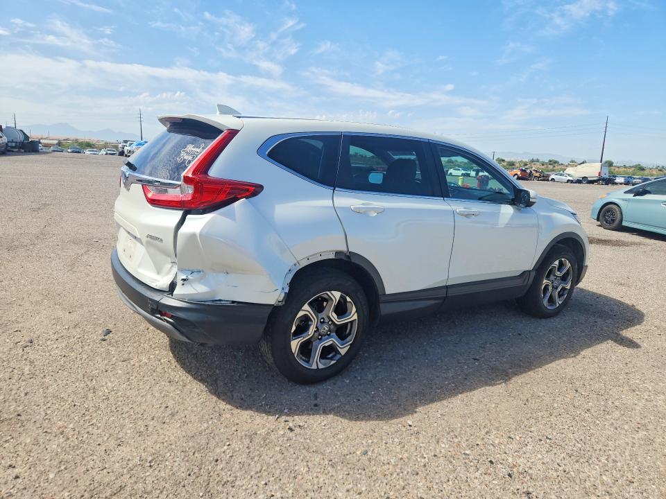 Photo 3 from auction – 2017 HONDA CR-V with VIN 2HKRW2H55HH668893