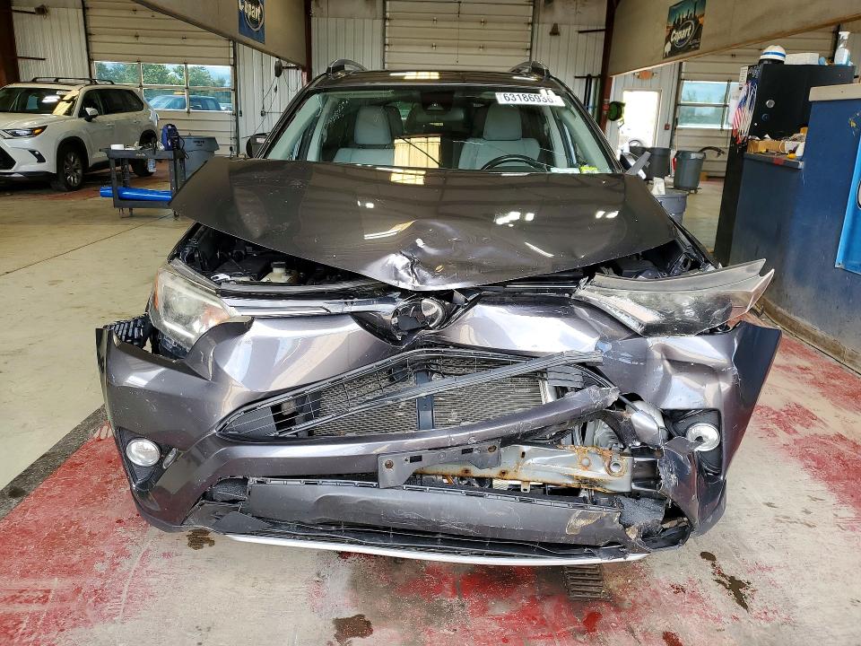 Photo 5 from auction – 2017 TOYOTA RAV4 with VIN JTMRFREV6HJ707348