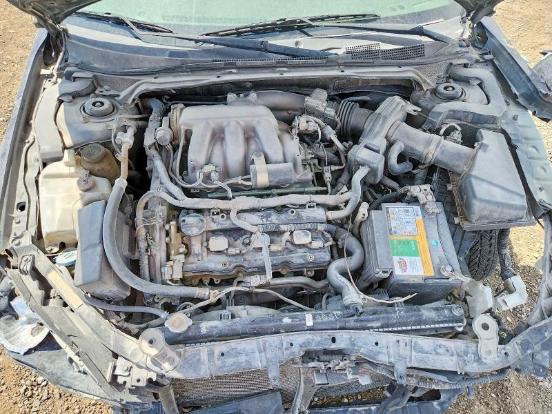 Photo 12 from auction – 2006 NISSAN ALTIMA with VIN 1N4BL11E66C143368