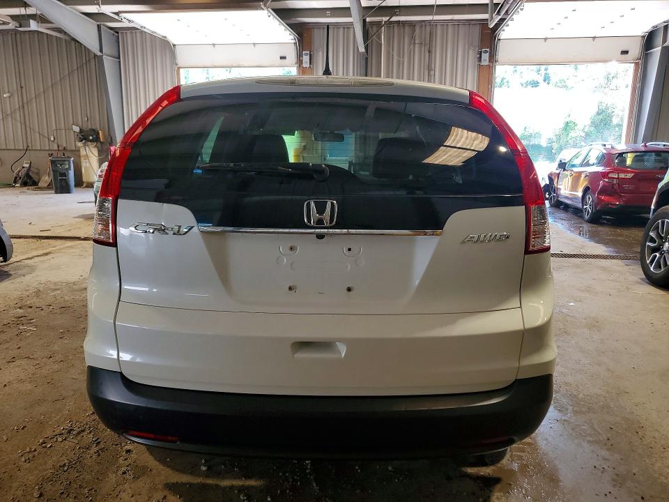 Photo 6 from auction – 2012 HONDA CR-V with VIN 5J6RM4H58CL079742