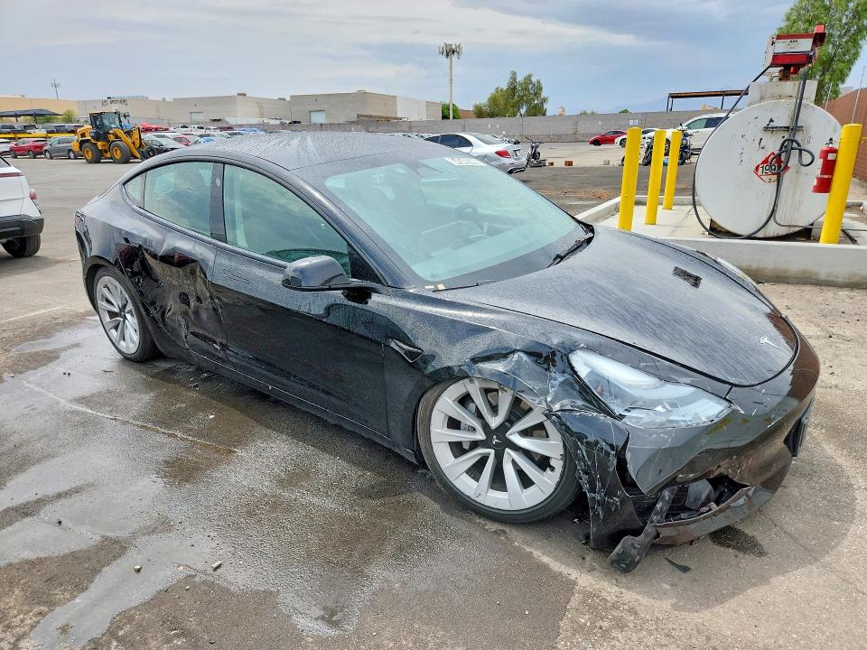 Photo 4 from auction – 2022 TESLA MODEL 3 with VIN 5YJ3E1EA2NF369683