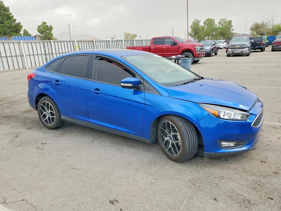 Photo 4 from auction – 2018 FORD FOCUS with VIN 1FADP3H21JL286810