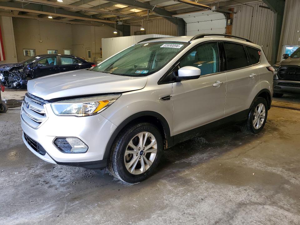 FORD ESCAPE 2018 with VIN 1FMCU9GD5JUA49778 - Photo from auction