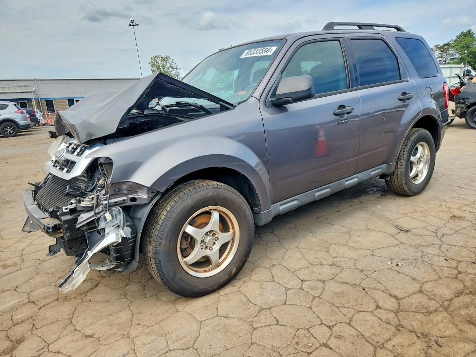 FORD ESCAPE 2011 with VIN 1FMCU0D71BKC53971 - Photo from auction