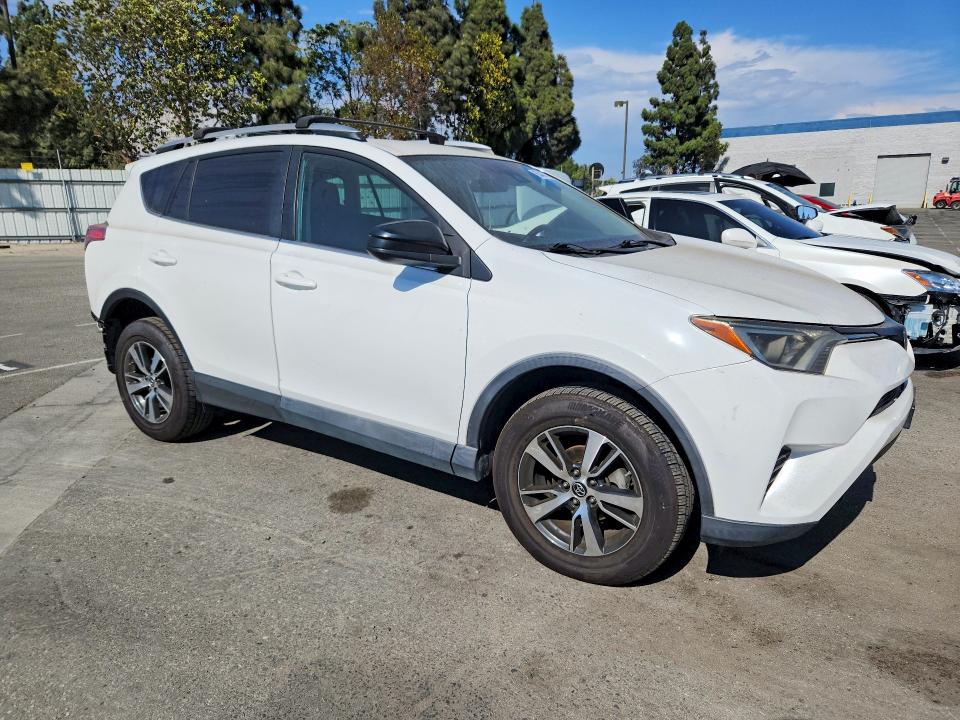 Photo 4 from auction – 2018 TOYOTA RAV4 with VIN 2T3ZFREV2JW415106