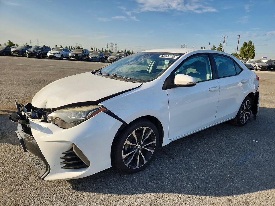 TOYOTA COROLLA 2017 with VIN 5YFBURHE7HP677758 - Photo from auction