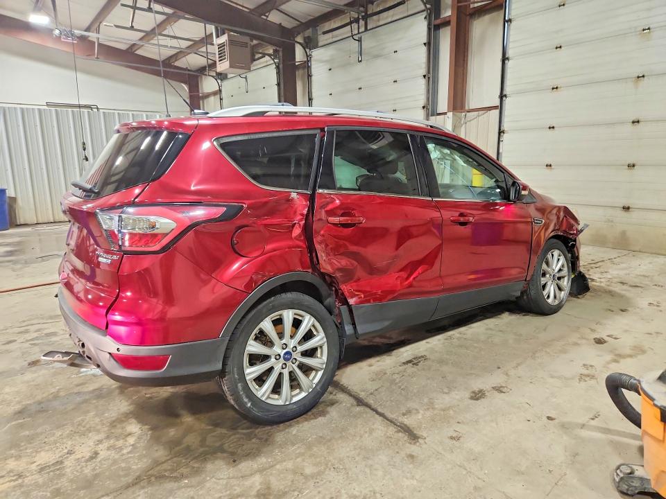 Photo 3 from auction – 2017 FORD ESCAPE with VIN 1FMCU9J92HUB91052