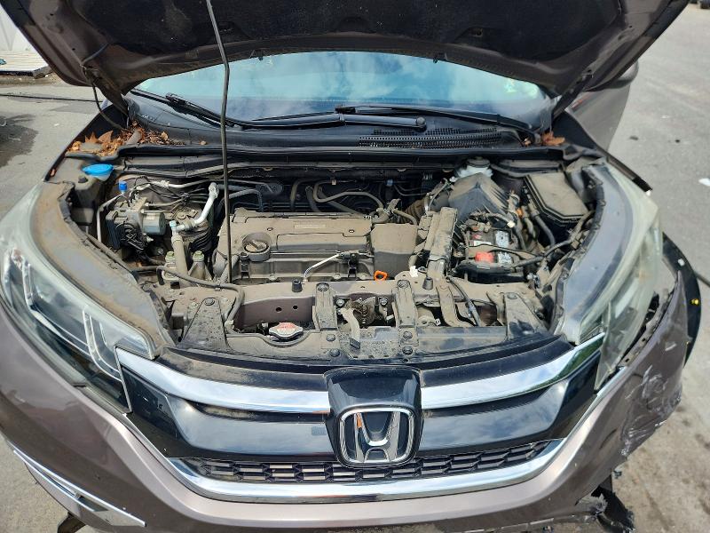 Photo 12 from auction – 2016 HONDA CR-V with VIN 2HKRM4H56GH688019