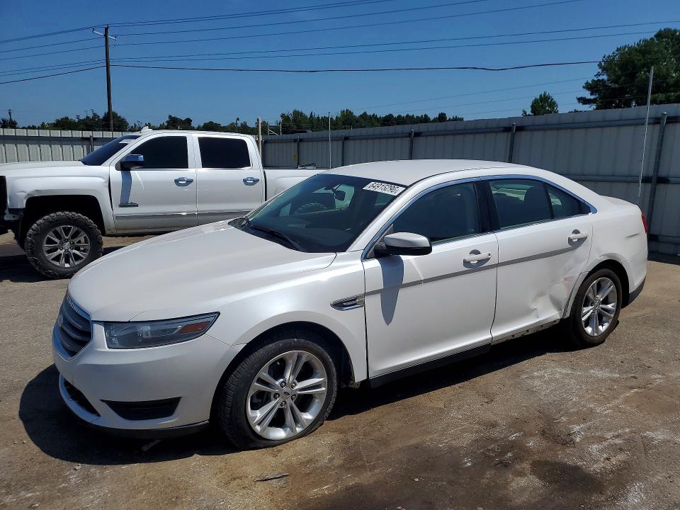 FORD TAURUS 2014 with VIN 1FAHP2E86EG112802 - Photo from auction