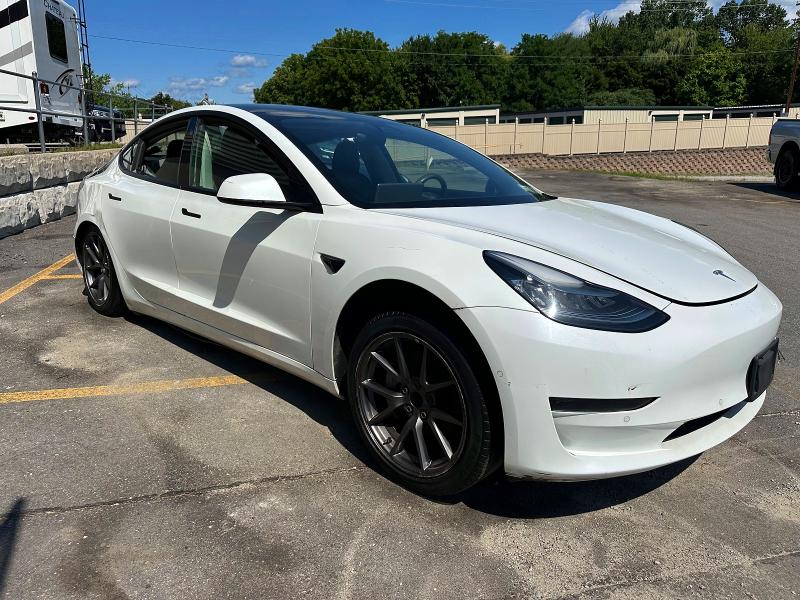 Photo 4 from auction – 2021 TESLA MODEL 3 with VIN 5YJ3E1EA9MF857852