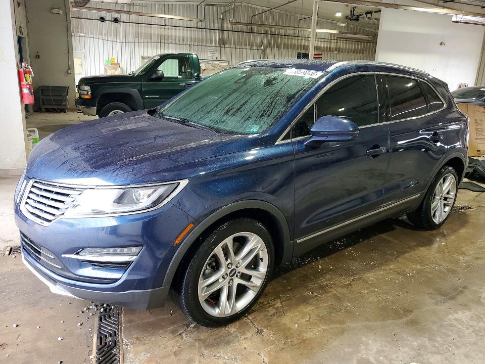 LINCOLN MKC 2015 with VIN 5LMTJ2AHXFUJ24913 - Photo from auction