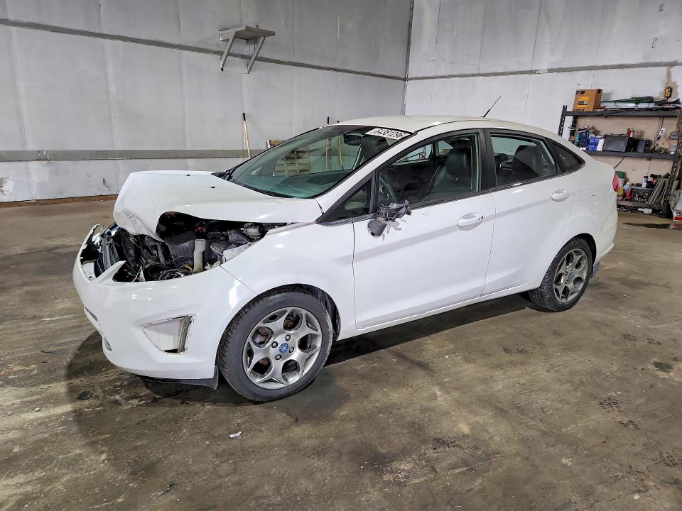 FORD FIESTA 2011 with VIN 3FADP4CJ7BM100191 - Photo from auction
