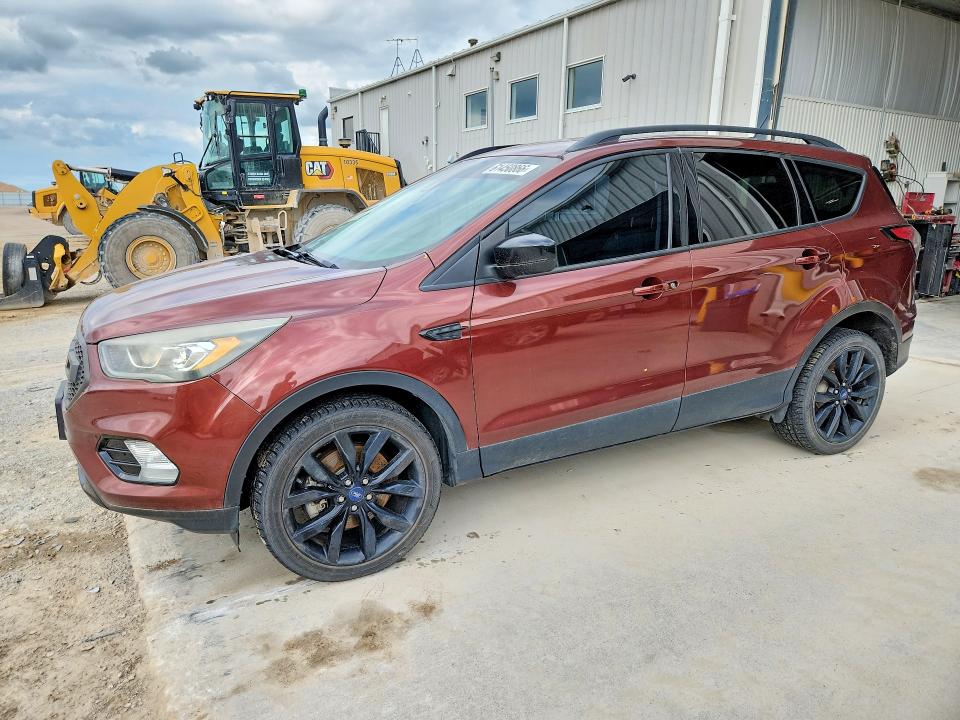 FORD ESCAPE 2018 with VIN 1FMCU9GD6JUA22816 - Photo from auction