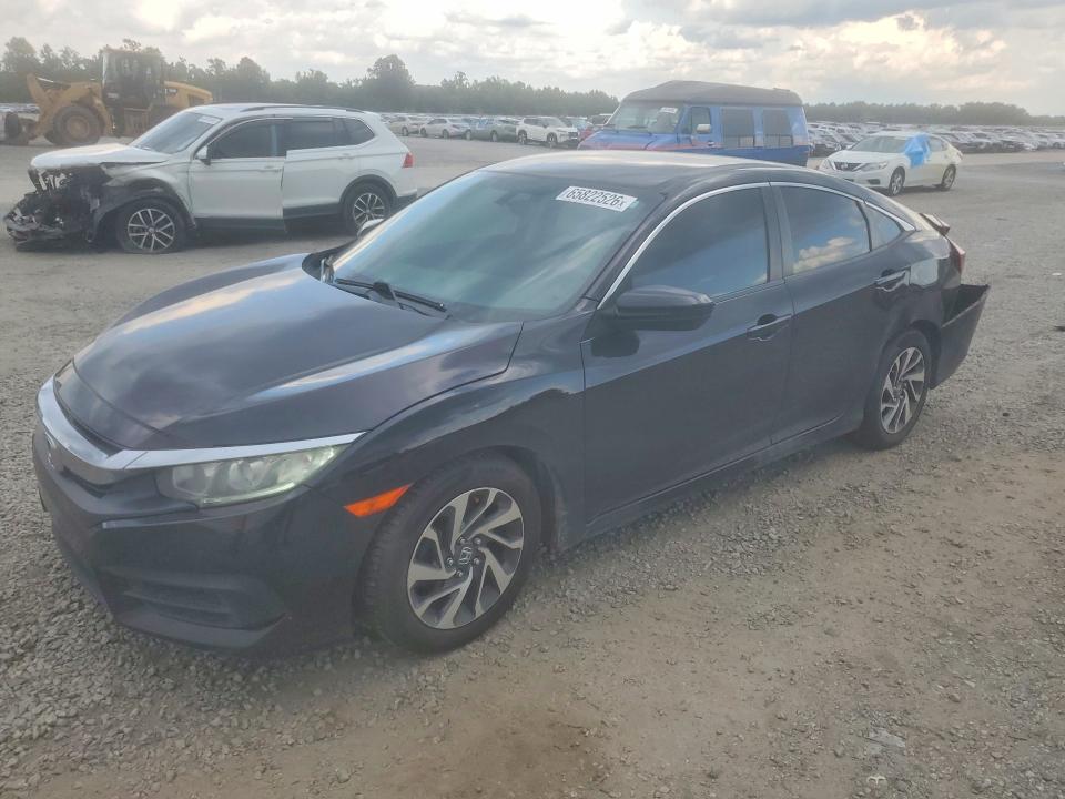 HONDA CIVIC 2016 with VIN 2HGFC2F5XGH575987 - Photo from auction