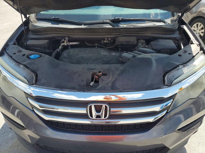 Photo 12 from auction – 2016 HONDA PILOT with VIN 5FNYF5H3XGB025528