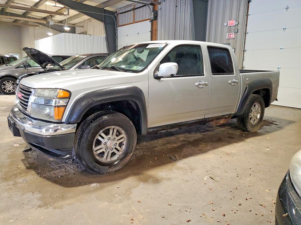 GMC CANYON 2011 with VIN 1GTH6MFE3B8128636 - Photo from auction