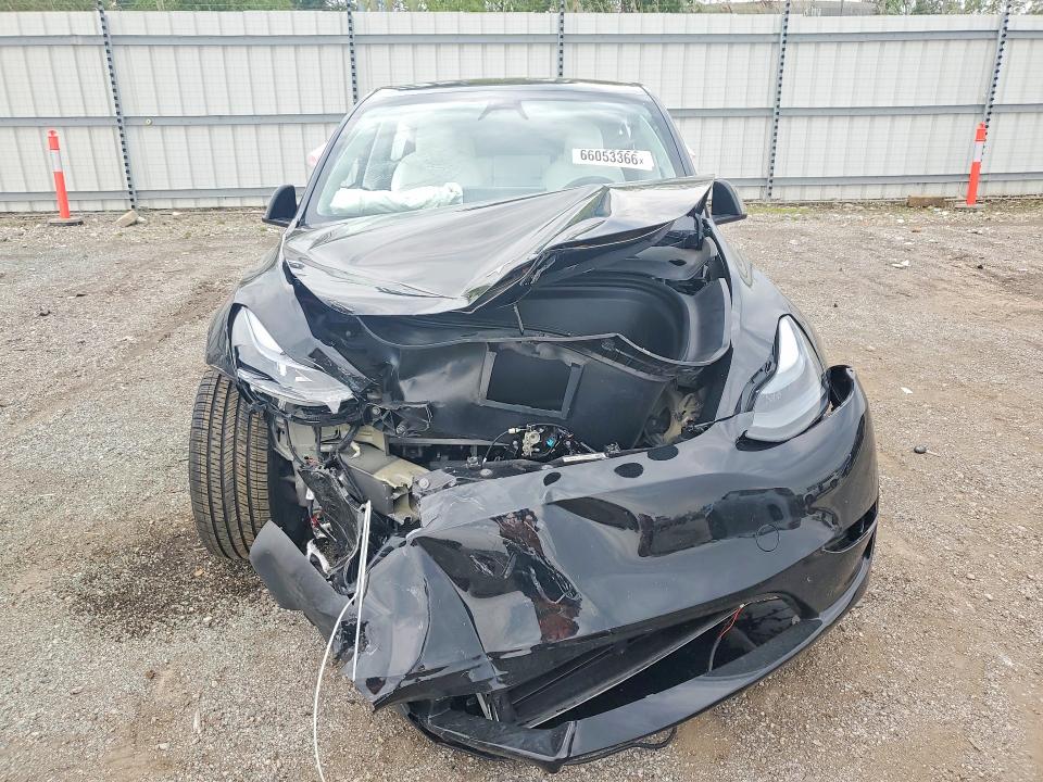 Photo 5 from auction – 2023 TESLA MODEL Y with VIN 7SAYGDEF1PF858899