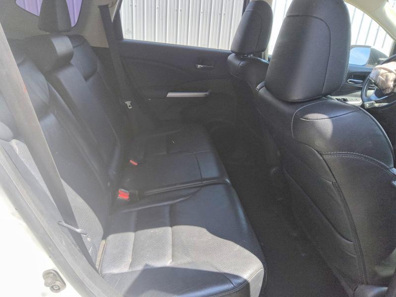 Photo 11 from auction – 2016 HONDA CR-V with VIN 5J6RM4H91GL048065