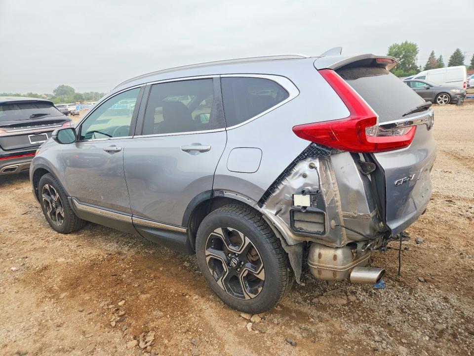 Photo 2 from auction – 2017 HONDA CR-V with VIN 5J6RW2H95HL000441