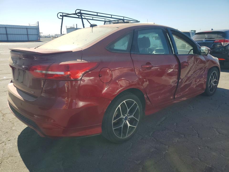 Photo 3 from auction – 2015 FORD FOCUS with VIN 1FADP3F26FL360216