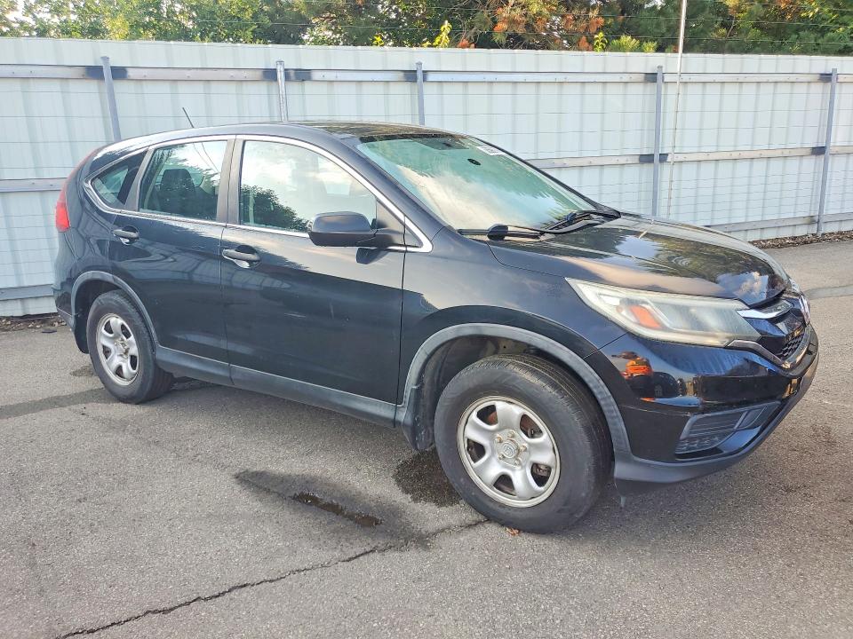 Photo 4 from auction – 2015 HONDA CR-V with VIN 5J6RM4H38FL038580
