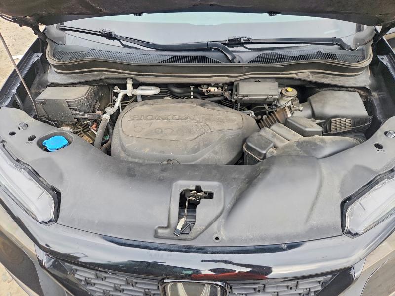 Photo 12 from auction – 2021 HONDA PASSPORT with VIN 5FNYF8H24MB003979